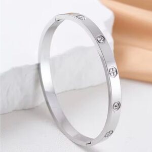 Silver Bangle Bracelet love inspired with zircon. One SZ available.